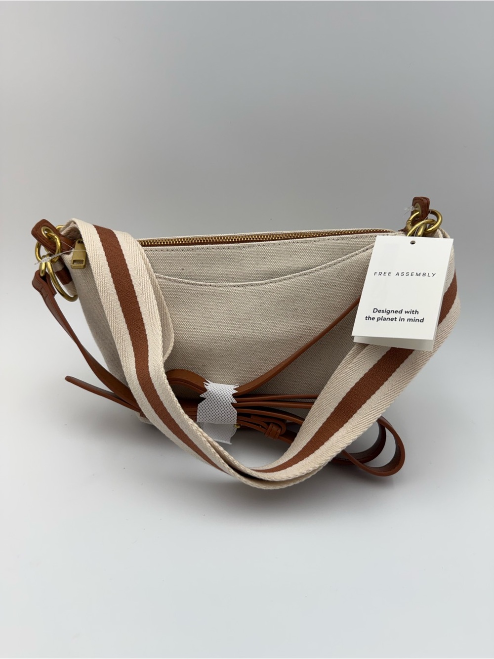 Free Assembly Beige Crossbody Bag Zip Top Adjustable Strap Pockets Gold Blue